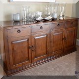F06. 4-Drawer wooden sideboard. 34”h x 70”w x 20”d 